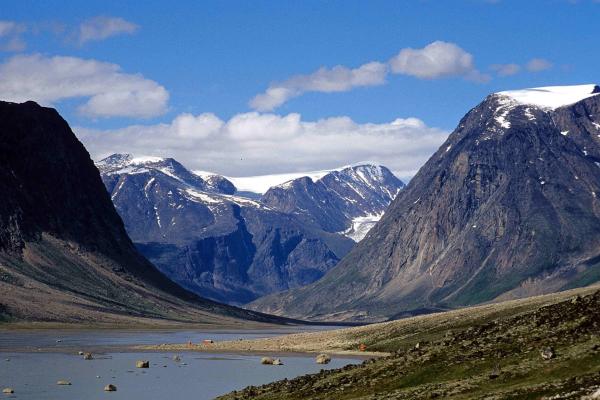 Snow-capped peaks above a glacial valley in Auyuittuq National Park, Nunavut