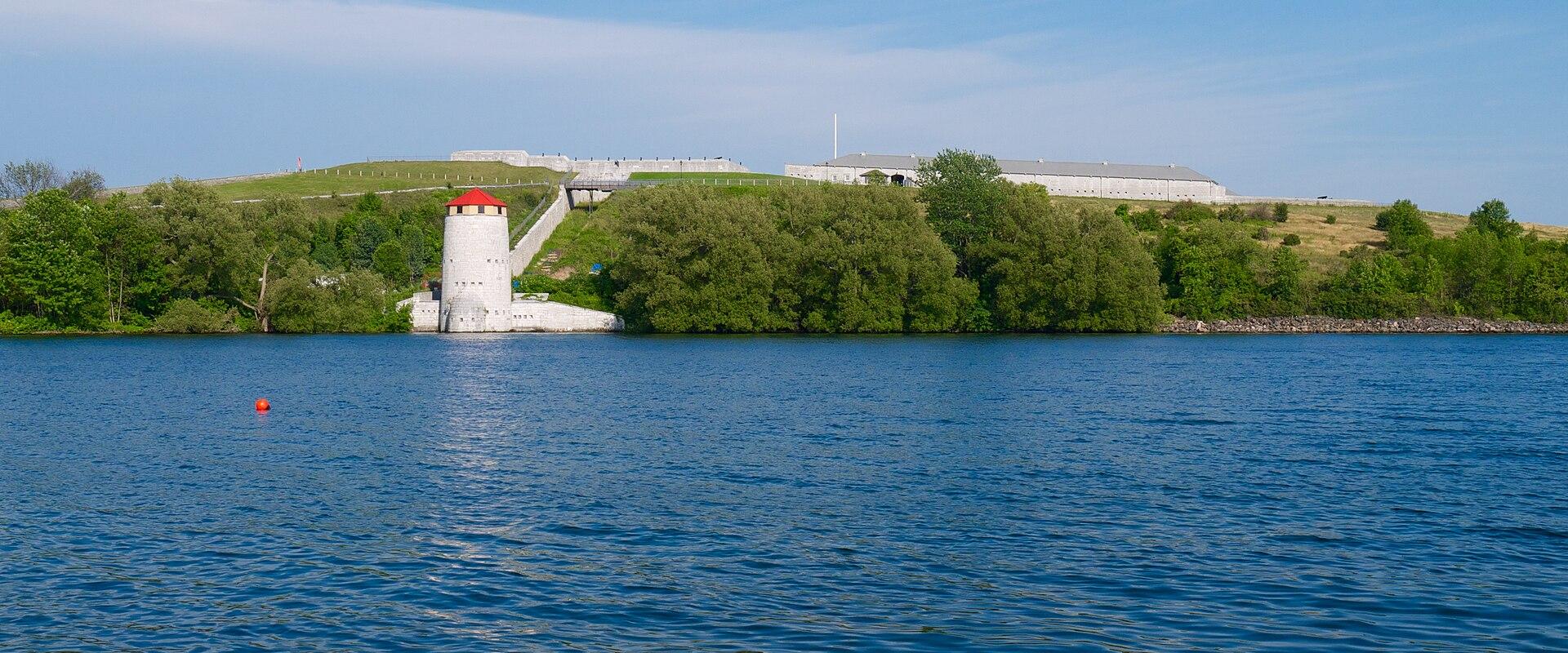 Fort Henry on its hill above the water at Kingston, with a Martello tower at the shore