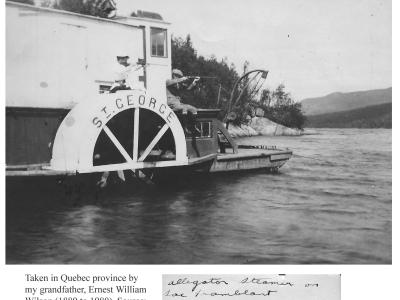 A black and white photograph of a paddlewheel steamboat named "ST. GEORGE" on a lake, with handwritten text below identifying it as an "alligator Steamer on Lac Tremblant" dated Sept, 1908.