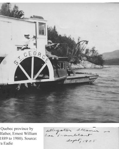 A black and white photograph of a paddlewheel steamboat named "ST. GEORGE" on a lake, with handwritten text below identifying it as an "alligator Steamer on Lac Tremblant" dated Sept, 1908.