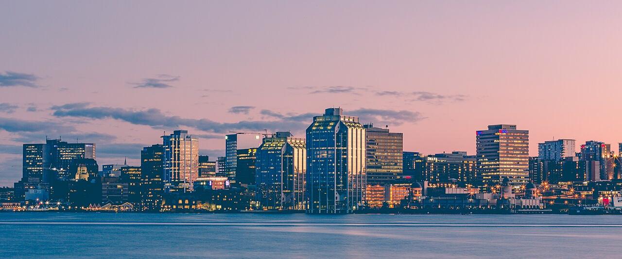 The Halifax skyline across the harbour at sunset