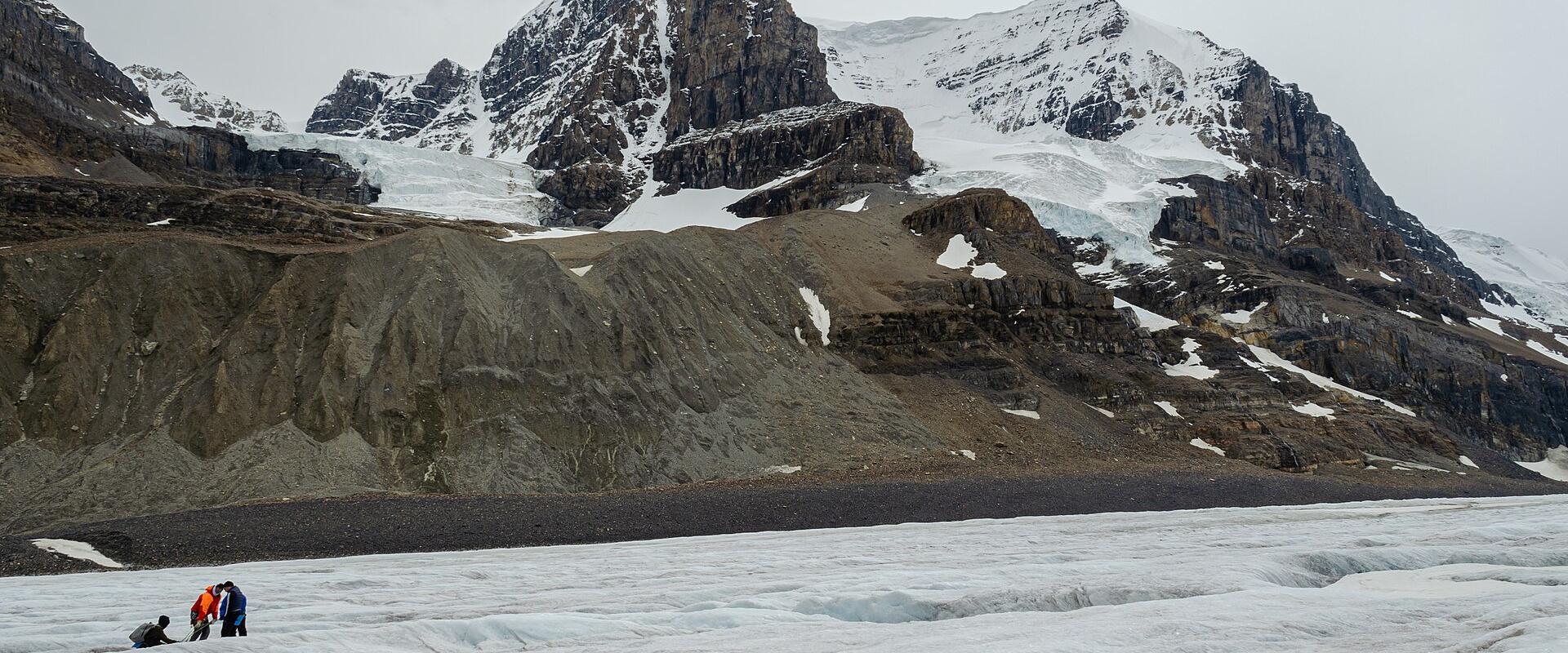 Visitors on the Athabasca Glacier below Mount Andromeda, Columbia Icefield