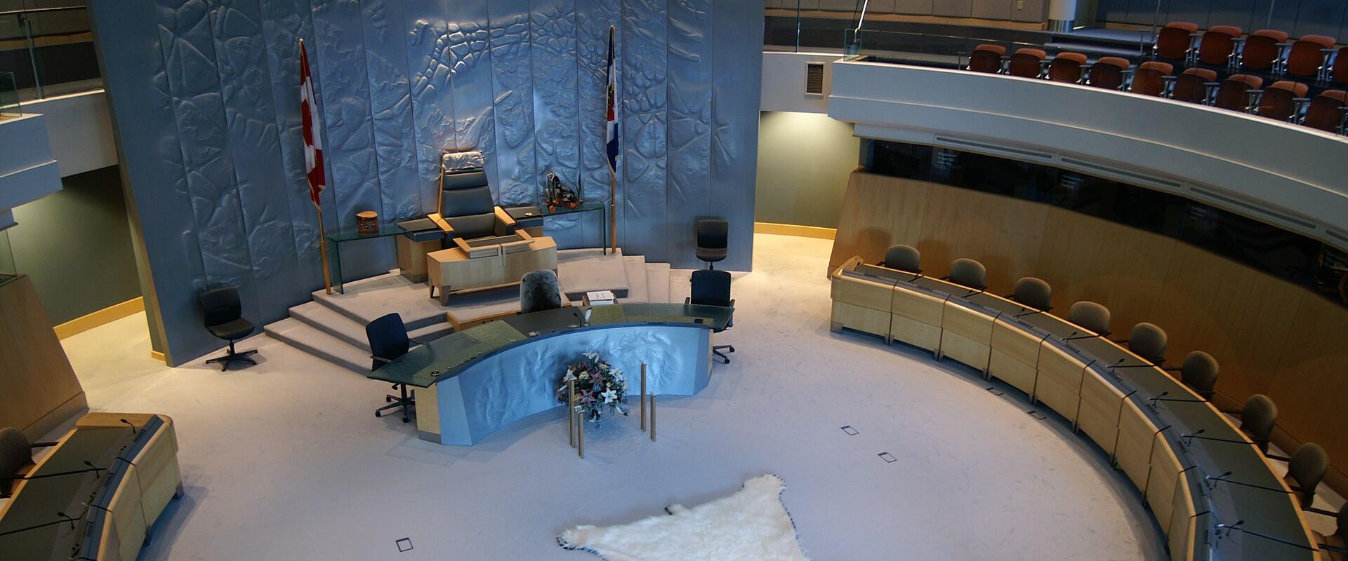 The circular chamber of the Northwest Territories Legislative Assembly with its polar bear rug