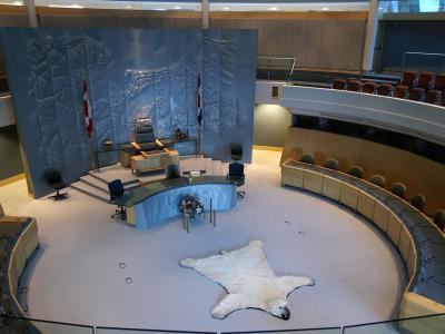 The circular chamber of the Northwest Territories Legislative Assembly with its polar bear rug